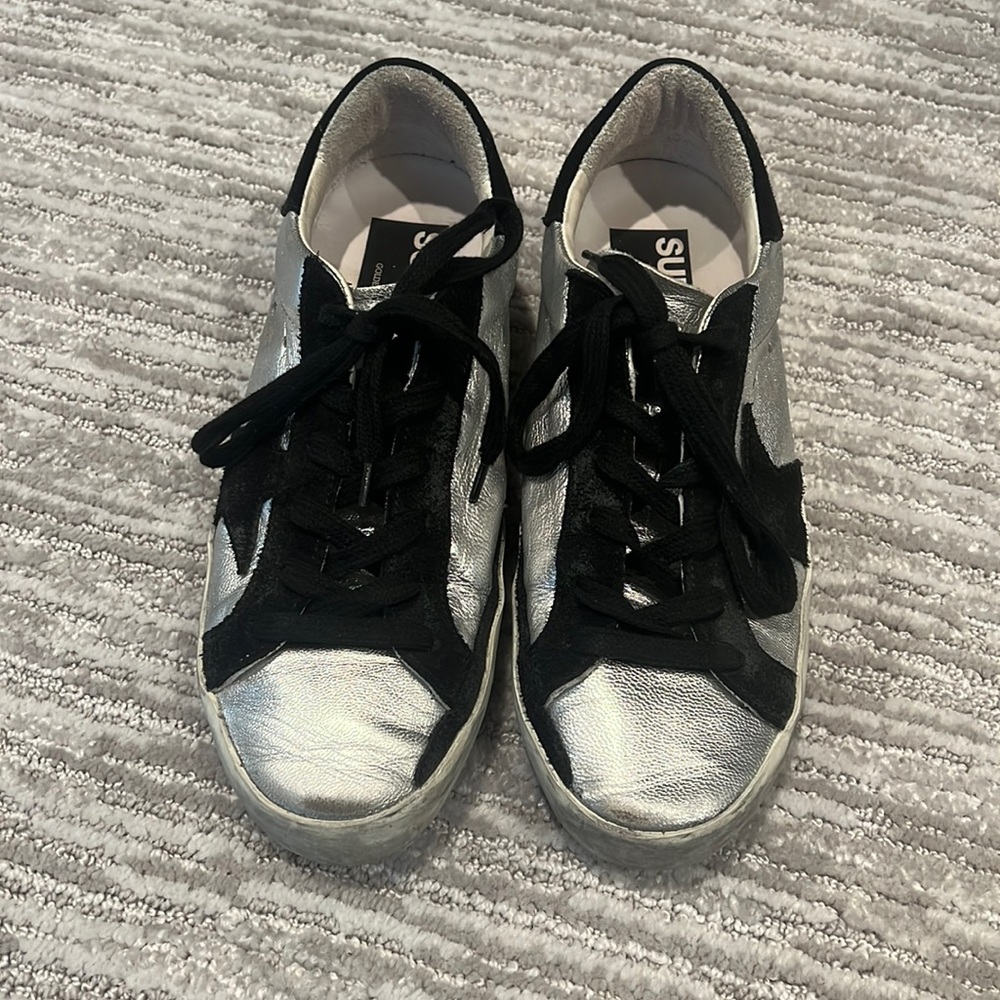 Silver and black Golden Goose sneakers
